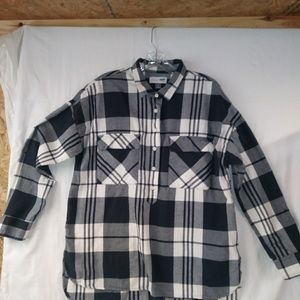 Woman's long sleeve plaid shirt.